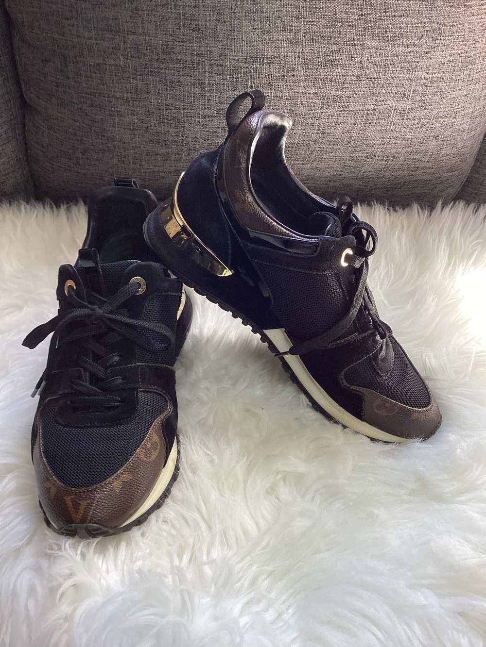 LOUIS VUITTON
Black Mesh Fabric And Leather Run Away Sneakers Size 38.5/8